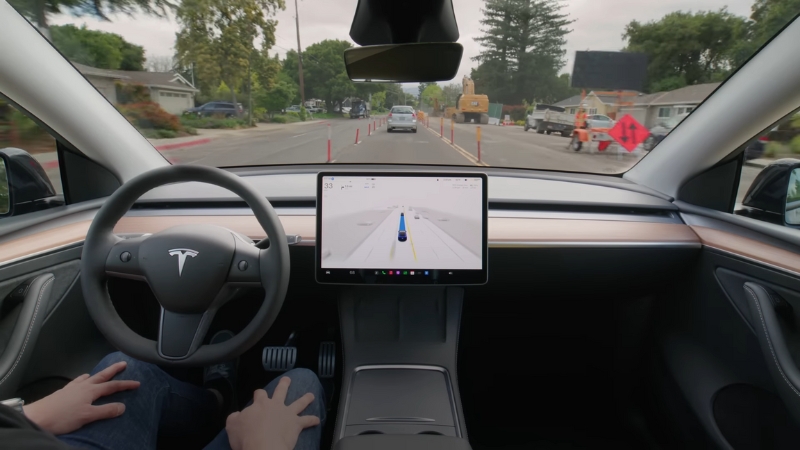 Tesla's Autopilot System Navigating a Suburban Road